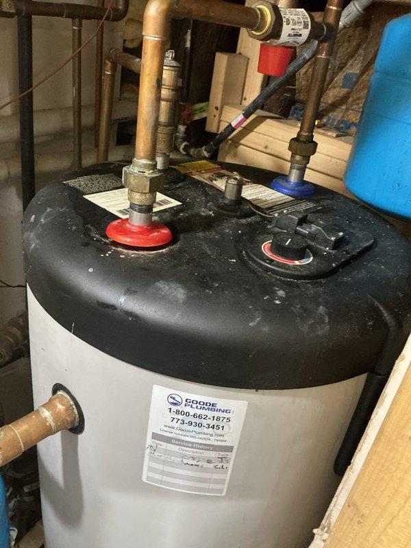 Responded to service call for no hot water issue at residential property. Upon arrival, inspected Navien tankless water heater and existing tank-style water heater system. Verified Navien unit was displaying 165°F on digital control panel with DHW indicator illuminated, confirming unit was receiving power and attempting to operate. Examined all plumbing connections, including PVC and copper piping, pressure relief valves, and shut-off valves on both units. Troubleshot system to identify cause of hot water delivery failure, checking for potential issues with temperature settings, flow restrictions, or equipment malfunction. Documented equipment conditions and system configuration with photographs for service records.