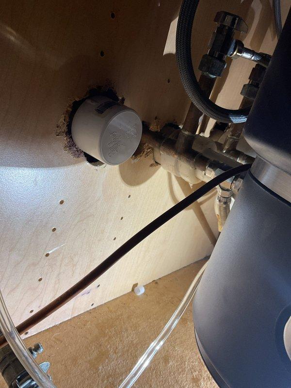 Completed estimate for replacement of deteriorated under-sink water shut-off valves. Inspection revealed corroded angle stops with mineral buildup and debris accumulation around drain assembly, along with staining at pipe penetrations indicating age-related deterioration of existing fixtures. Documented existing plumbing configuration including supply lines, drain connections, and cabinet accessibility for replacement recommendations.