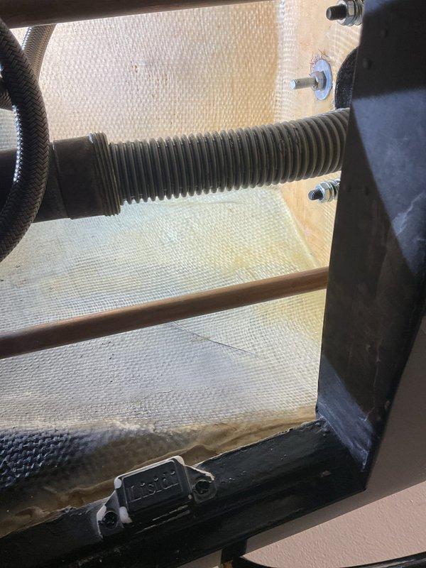 Responded to a water leak at a shampoo bowl that was not properly secured to the plumbing connections. Upon inspection, accessed the wall cavity through the service panel and identified loose mounting hardware and inadequate sealing at the bowl's drain connection. Tightened all mounting bolts, reconnected the drainage assembly with proper sealing, and verified the copper supply line connections were secure to prevent future leaks.