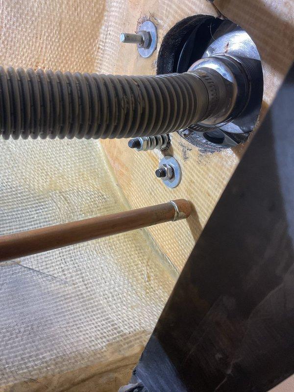 Responded to a water leak at a shampoo bowl that was not properly secured to the plumbing connections. Upon inspection, accessed the wall cavity through the service panel and identified loose mounting hardware and inadequate sealing at the bowl's drain connection. Tightened all mounting bolts, reconnected the drainage assembly with proper sealing, and verified the copper supply line connections were secure to prevent future leaks.