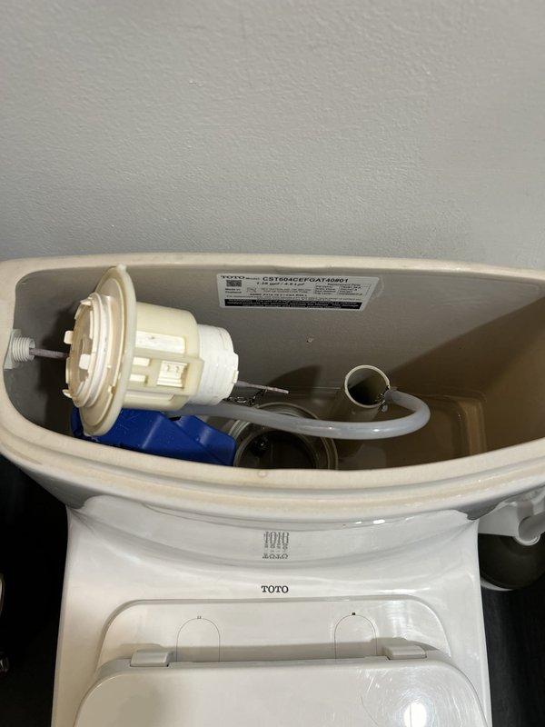 Responded to warranty callback for leaking toilet following previous rebuild service. Upon inspection, identified faulty fill valve seal causing water seepage into tank. Removed and replaced defective fill valve gasket and reseated flush valve assembly to ensure proper seal. Tested system through multiple flush cycles to verify leak was eliminated and all components functioning correctly.