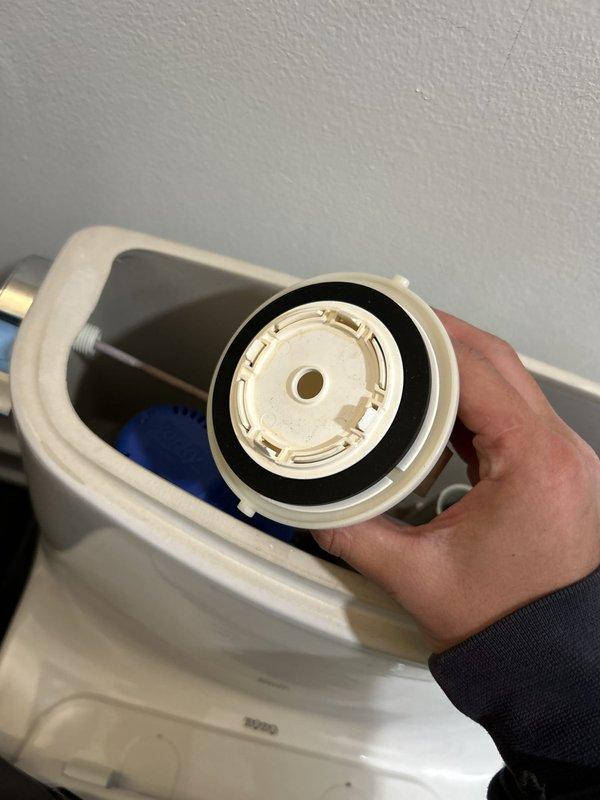 Responded to warranty callback for leaking toilet following previous rebuild service. Upon inspection, identified faulty fill valve seal causing water seepage into tank. Removed and replaced defective fill valve gasket and reseated flush valve assembly to ensure proper seal. Tested system through multiple flush cycles to verify leak was eliminated and all components functioning correctly.