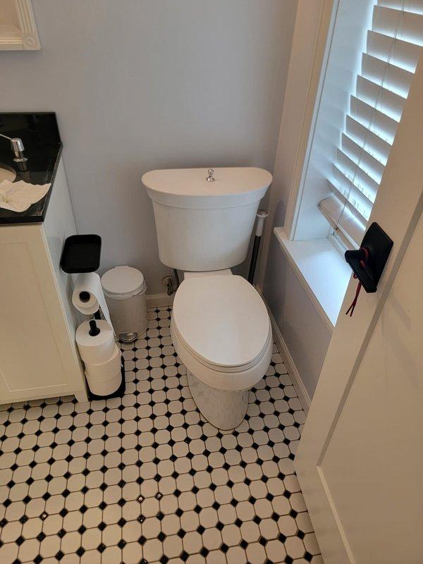 Responded to service call for non-flushing toilet. Removed existing toilet and replaced defective closet flange collar to ensure proper seal and prevent future leaks. Installed new Kohler Wellworth toilet, connected water supply line, and tested flush mechanism for proper operation. Verified all connections were secure and leak-free upon completion.