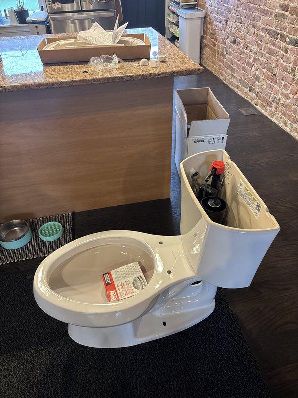 Responded to service call for non-flushing toilet. Removed existing toilet and replaced defective closet flange collar to ensure proper seal and prevent future leaks. Installed new Kohler Wellworth toilet, connected water supply line, and tested flush mechanism for proper operation. Verified all connections were secure and leak-free upon completion.