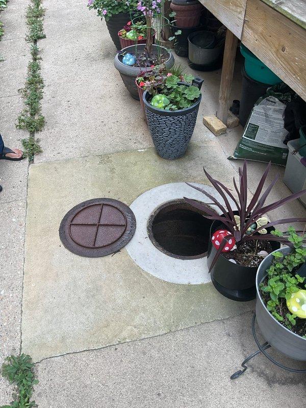 Performed high-pressure jetting service on catch basin installed in 2020 that had never been previously maintained. Accessed the basin through outdoor patio opening, removed rusted metal cover, and deployed jetter equipment into the cylindrical cavity. Successfully cleared accumulated debris and buildup from interior walls and drainage system using hydro-jetting techniques. Basin showed significant rust and corrosion throughout metal components but structural integrity remained intact. Completed thorough cleaning of drainage pathway to restore proper flow capacity and prevent future blockages.
