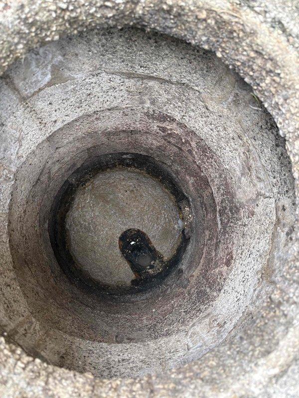 Responded to service call for catch basin rodding from building to street connection. Successfully cleared the catch basin using mechanical rodding equipment to remove accumulated debris and sediment blocking the drainage system. Verified proper flow and drainage operation upon completion of the cleaning process.