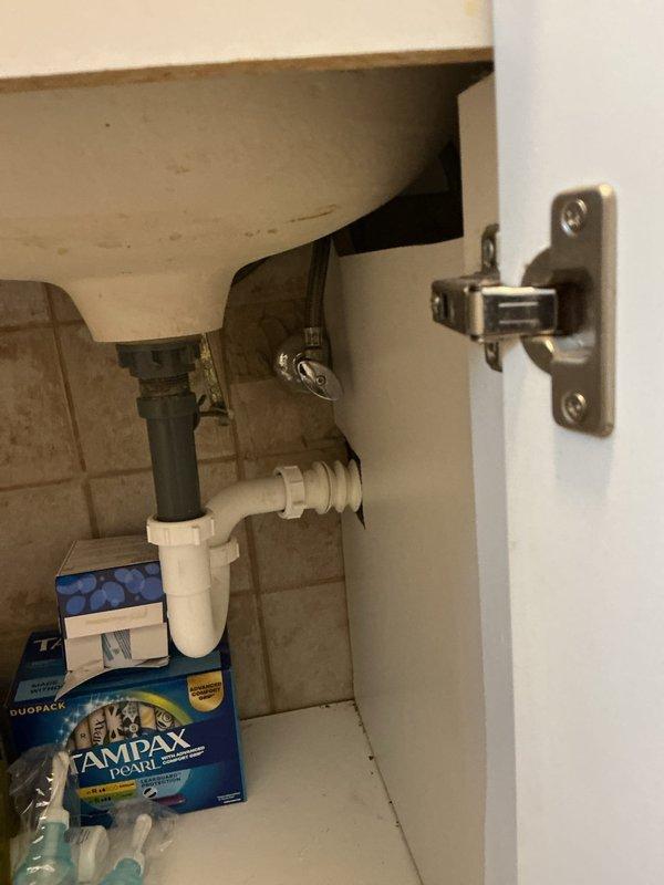 Replaced existing chrome bathroom sink faucet with new fixture, including removal of old two-handle assembly and installation of updated faucet with proper supply line connections. Verified all connections under sink were secure and leak-free, tested hot and cold water flow through both handles, and confirmed proper drainage operation.