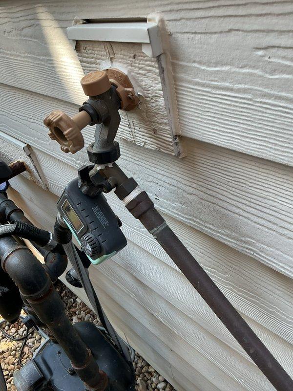 Responded to a follow-up service call for a booster pump system in a 2-unit building that was continuously cycling on and off. Conducted comprehensive evaluation of the booster pump system, including pressure testing, control settings verification, and system diagnostics to isolate the root cause of the cycling issue. Inspected the existing plumbing infrastructure, including tankless water heater connections, expansion tank, pressure regulation components, and associated copper piping and valve assemblies. Examined exterior booster pump components and control mechanisms for proper operation and potential defects. Documented system configuration with photos showing dual tankless water heater setup with integrated plumbing network and external pump controls for further analysis and recommendations.