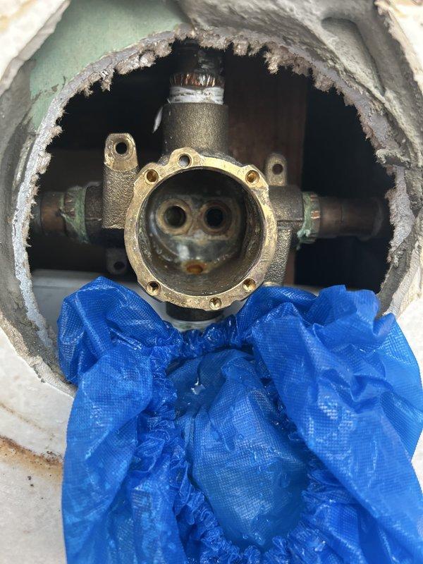 Responded to service call for sediment blockage in three shower fixtures following recent water heater replacement. Shut off building main water supply due to absence of individual fixture shutoffs. Removed and inspected shower cartridges from all three affected fixtures, finding significant sediment accumulation restricting water flow. Flushed cartridges and valve bodies to clear debris, reinstored water supply, and tested all fixtures to confirm proper flow restoration.