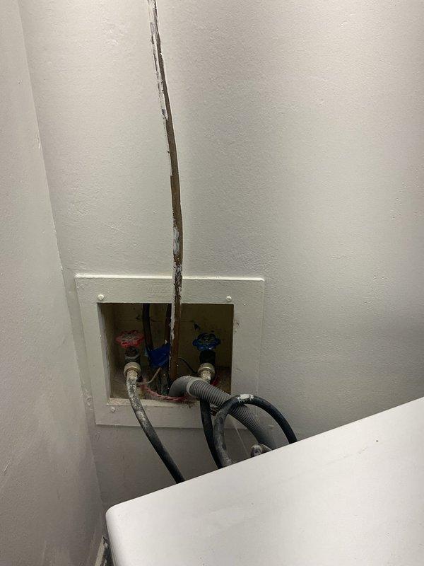 Responded to frozen washing machine supply valves preventing appliance replacement. Upon inspection, found both hot and cold water shut-off valves seized in the open position within wall access panel. Assessed valve condition and determined replacement was most cost-effective solution due to corrosion and age of existing quarter-turn valves. Successfully replaced both supply valves with new quarter-turn ball valves, ensuring proper water flow control for future appliance servicing. Reconnected braided supply lines to new valves, tested for leaks, and verified full operational functionality of shut-off mechanisms.