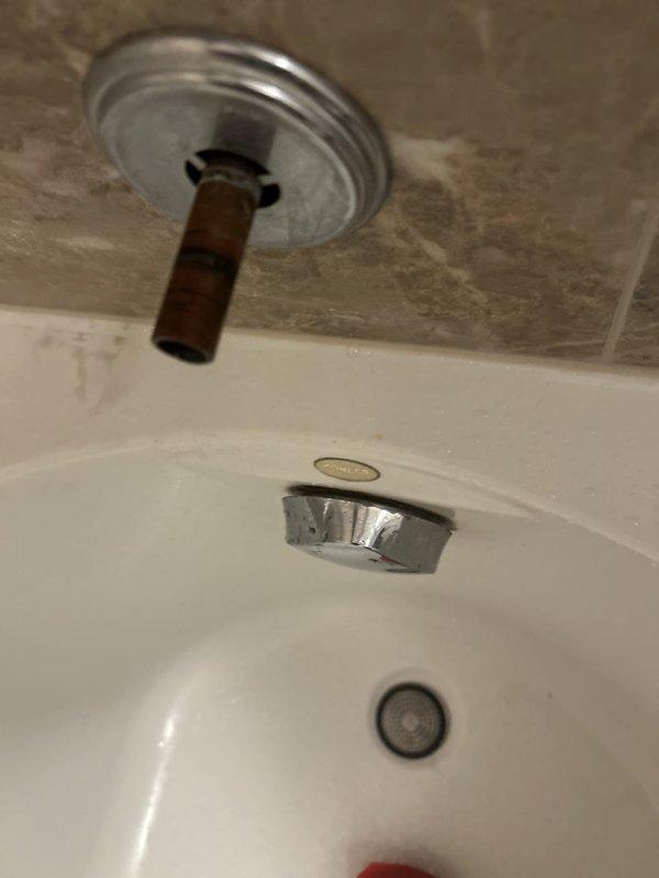 Responded to recurring faucet leak at bathroom sink for membership plan customer. Upon arrival, found deteriorated chrome-plated wall-mount spout with visible corrosion and finish degradation exposing underlying metal. Removed failed fixture and assessed wall-mounted copper supply pipe, which showed age-related patina but remained structurally sound. Provided on-site quote as requested, then proceeded with replacement of corroded spout assembly. Installed new chrome wall-mount faucet spout with proper escutcheon plate, ensuring secure connection to existing copper stub-out. Tested for leaks under full water pressure and verified proper flow rate and drainage. Documented conditions with photographs showing before and after states of installation.