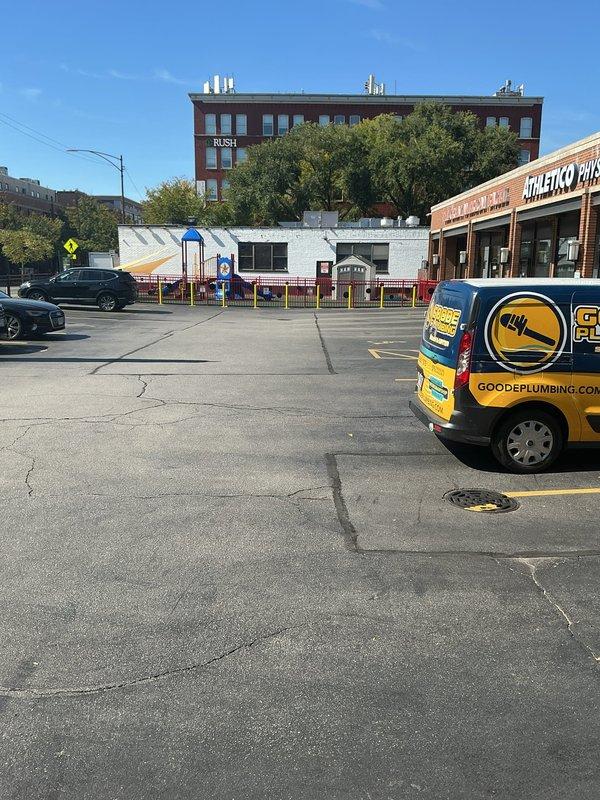 Conducted site assessment for commercial flood control system installation at a property without existing basement infrastructure. Evaluated parking lot drainage conditions and existing infrastructure, including assessment of current drainage covers and asphalt surface conditions. Documented site conditions and provided estimate for full flood control system installation, which may require parking lot excavation to accommodate new drainage infrastructure.