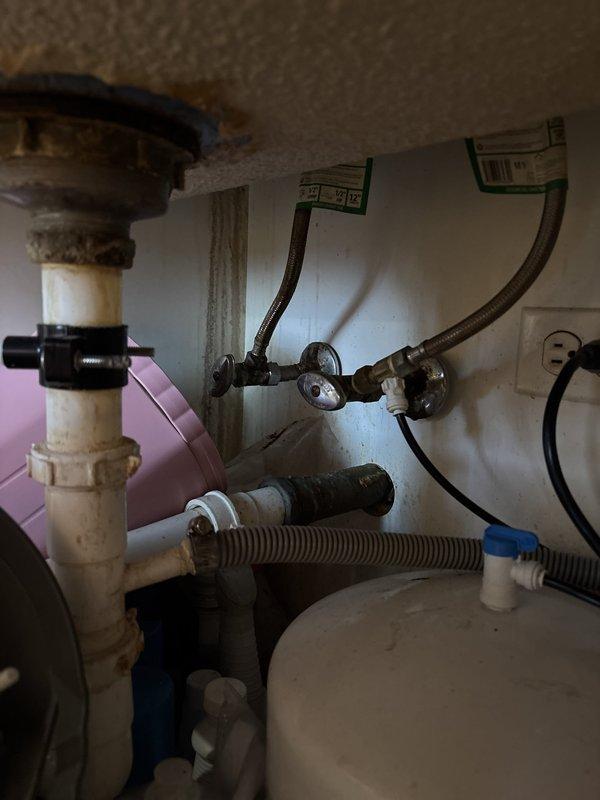 Completed commercial plumbing repair service involving installation of new water supply lines and connections. Installed braided stainless steel flex supply line to toilet with wall-mounted shut-off valve, and serviced under-sink plumbing system including garbage disposal connections, water supply lines, and filtration equipment to ensure proper operation and code compliance.