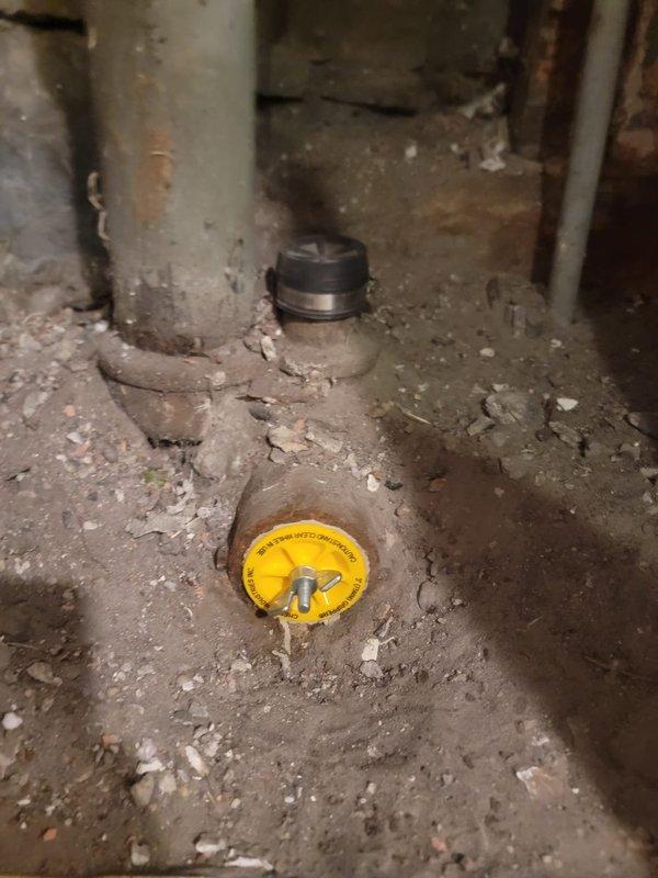 Performed sewer line camera inspection per customer request. Accessed main sewer line through basement floor drain cleanout and conducted video inspection of underground waste piping to assess condition and identify any blockages or structural issues. Inspection completed within customer's specified time constraints, with documentation provided through photographic records of access point and plumbing configuration.