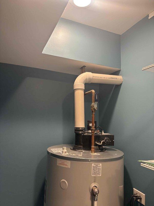 Responded to customer inquiry regarding installation of external gas line hookup for patio grill. Conducted site assessment and documented existing gas water heater installation and utility room configuration to evaluate feasibility of extending gas service. Inspected current gas piping system, connections, and shut-off valves to determine appropriate tie-in point for new exterior gas line installation.