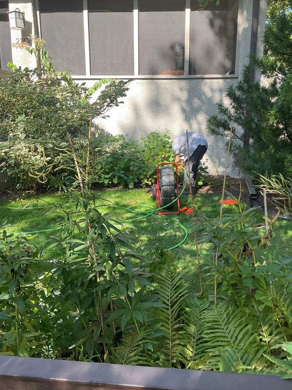 Responded to a sewer rodding service call at a residential property. Accessed the main sewer line through the basement cleanout and performed mechanical rodding to clear the line. Extended rodding services to the exterior yard area, working through outdoor access points to ensure complete clearance of the sewer system from the building to the main connection point.