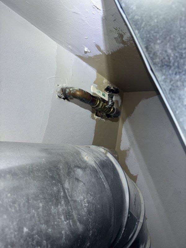 Responded to service call for loss of hot water at shower while other fixtures maintained proper hot water supply. Performed comprehensive plumbing evaluation to diagnose isolated hot water loss at shower fixture. Inspected shower valve assembly and related components to identify potential cartridge failure or internal valve malfunction causing hot water delivery issue. Evaluated multiple bathroom faucets and showerheads throughout the property as requested, documenting conditions and identifying fixtures requiring attention. Removed and inspected sink drain assemblies to assess functionality and condition. Identified corroded piping and valve connections showing significant deterioration, rust buildup, and water staining on surrounding surfaces indicating long-term moisture exposure. Documented all findings with photographic evidence of corroded components and fixtures requiring service. Provided technical assessment of shower valve system and discussed repair versus replacement optio