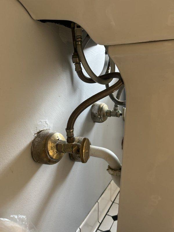 Responded to same-day service request for bathroom fixture replacements. Successfully replaced bathroom sink hardware, including new supply lines and shut-off valves, removing aged brass fittings and installing updated components. Installed new bidet fixture and replaced toilet seat as requested. All plumbing connections were secured and tested for proper operation and leaks.
