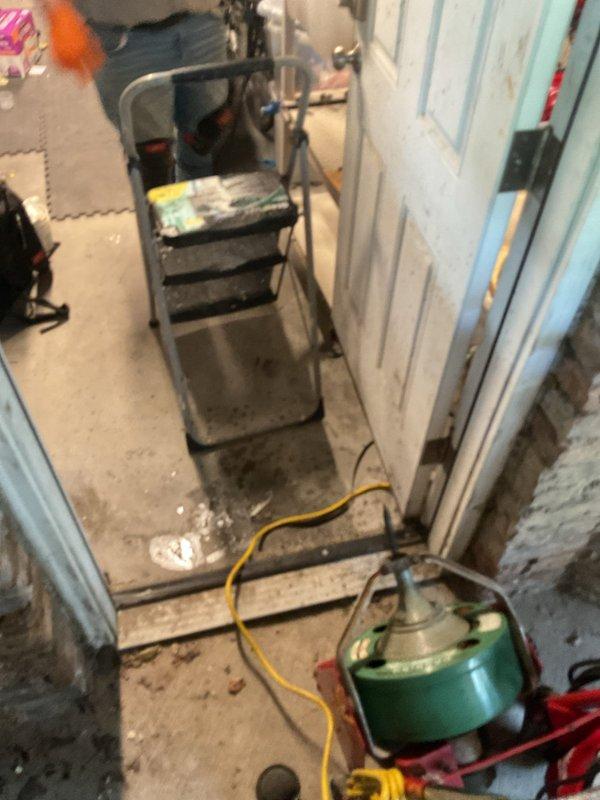 Responded to a clogged drain call at a residential property. Upon arrival, accessed the basement utility area where the main drain line was located. Utilized a mechanical drain snake with power auger equipment to clear the blockage in the drainage system. Successfully restored proper water flow through the affected plumbing lines and tested the system to confirm the obstruction was fully removed.
