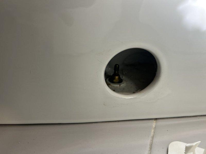 Responded to residential plumbing service call for leak underneath kitchen or bathroom sink. Upon arrival, inspected sink basin and drain assembly, identifying source of water leak in drain connections or supply lines beneath fixture. Tightened connections, replaced worn washers or gaskets as needed, and verified leak was resolved with water flow test. Additionally addressed secondary concern of loose toilet as noted in service request. Inspected toilet mounting bolts and wax ring seal, tightening closet bolts to secure fixture to floor flange and eliminate movement. Confirmed proper toilet stability and tested flush mechanism for proper operation. Documented conditions with photographs of both fixtures showing completed work. All plumbing fixtures left in proper working order with no active leaks detected at time of departure.