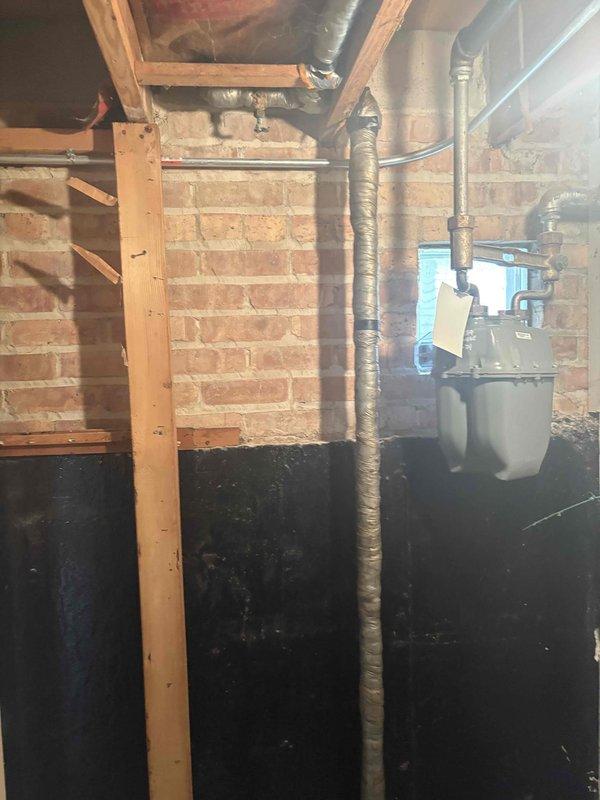 Performed on-site evaluation and estimate for replacing two exterior hose bibbs with frost-proof sillcocks, replacing the ball valve on the main water supply line, and installing a dedicated water supply line for the refrigerator. Inspected the basement piping, including insulated supply lines near the main shutoff, noting corrosion and a drain fitting at the existing main line, and documented routing paths with photos. Estimate prepared for the customer's review, with no work performed at this time.