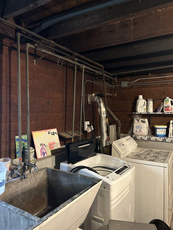 Diagnosed low hot water pressure at the tub/shower following a water heater drain-down and restored proper flow. Inspected the water heater and associated galvanized supply piping, flushed the system to clear sediment and trapped air, and verified full hot water pressure and flow at the fixtures.