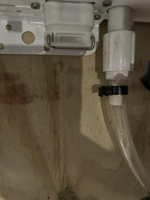 Responded to a warranty callback for a persistent slow drip at the tankless water heater condensate neutralizer. Inspected the neutralizer filter housing, condensate drain tubing, and PVC/clamp connections, and addressed the leak at the condensate line to stop discharge onto the basement floor. Verified the condensate drain assembly was secure and draining properly.