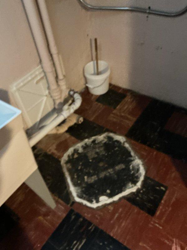 Responded to a clogged kitchen sink drain complaint and inspected the drain line and accessible cleanout/drain assembly in the basement utility area. Cleared the blockage from the drain line, restoring proper flow, and verified normal drainage from the fixture.