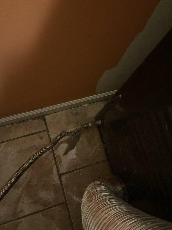 Responded to a reported gas leak at the dryer connection following appliance relocation. Inspected the flexible corrugated gas connector and shutoff valve assembly, then reconnected and sealed the connector at the appliance with proper thread sealant. Restored gas supply and pressure tested the connection, confirming no leaks and a secure, code-compliant installation.