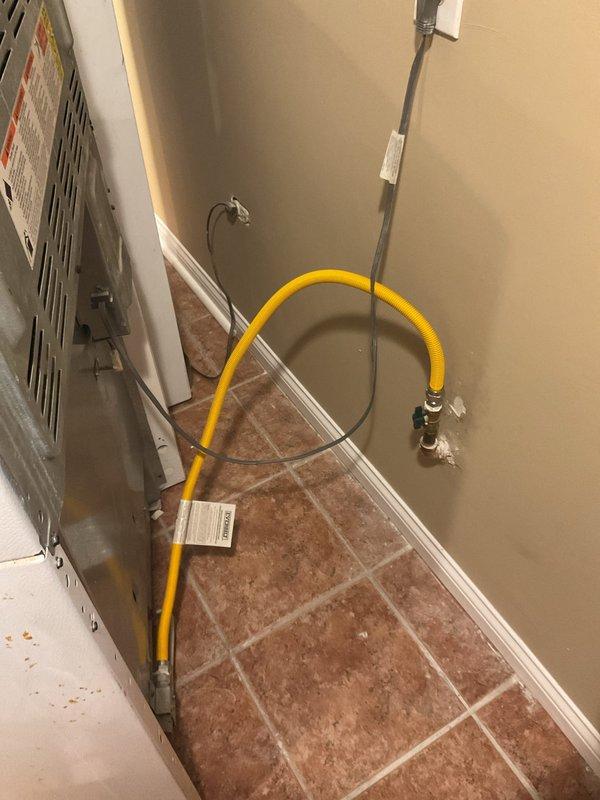 Performed a sewer camera inspection on the main drain line of a newly purchased home to check for obstructions, damage, or conditions that could cause backups or flooding. Also connected the gas range using a flexible corrugated gas connector from the wall shutoff valve and verified the connection was secure. Documented the work with photos of the appliance connection and the crawl space mechanical and ductwork area.