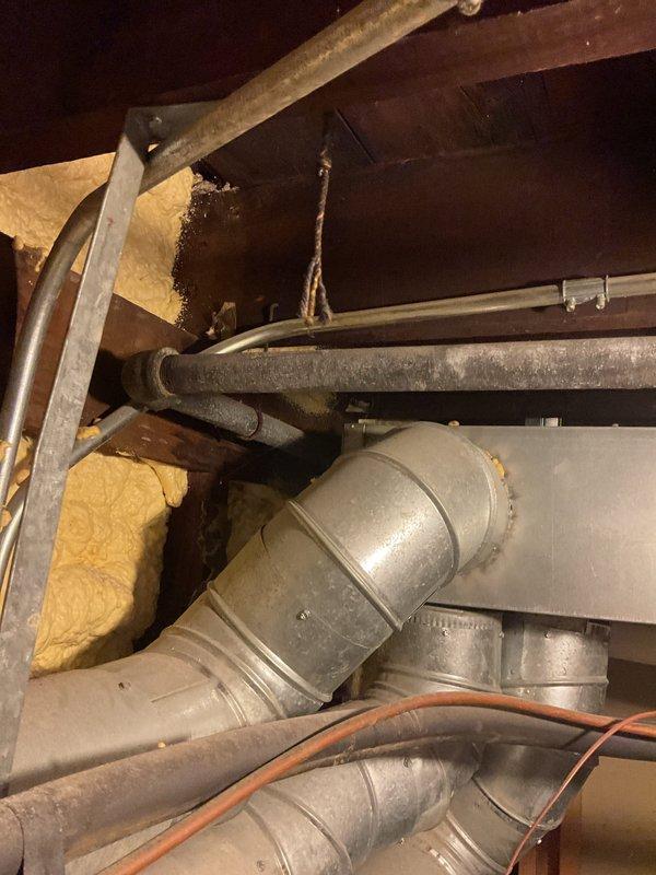 Performed a sewer camera inspection on the main drain line of a newly purchased home to check for obstructions, damage, or conditions that could cause backups or flooding. Also connected the gas range using a flexible corrugated gas connector from the wall shutoff valve and verified the connection was secure. Documented the work with photos of the appliance connection and the crawl space mechanical and ductwork area.