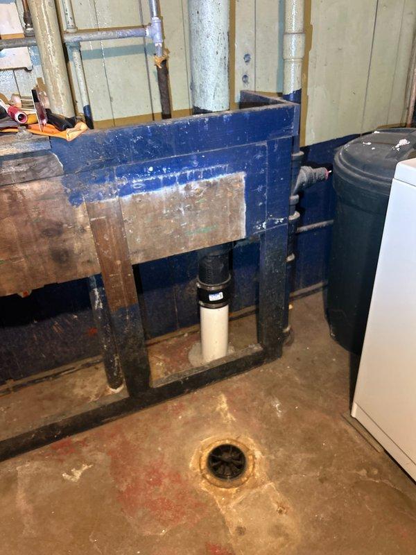 Performed water heater maintenance and flush, and inspected the repaired drain stack with a camera to evaluate a reported blockage. Observed the PVC drain stack with a wye fitting and cleanout plug connected to the existing metal pipe by a band coupling, and assessed the need for an additional cleanout for future access. Catch basin cleaning was evaluated, with an estimate to be provided prior to proceeding.