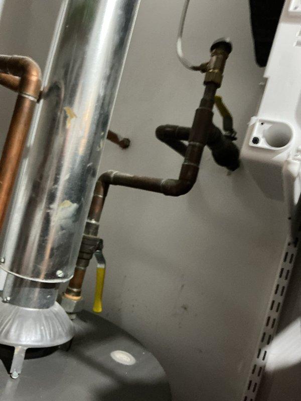 Located and repaired a small water leak behind the washing machine, identified during a new washer installation. Inspected the supply valves and connections in the laundry area, corrected the leak at the source, and tested the system under pressure to confirm all fittings were dry and the repair was watertight.