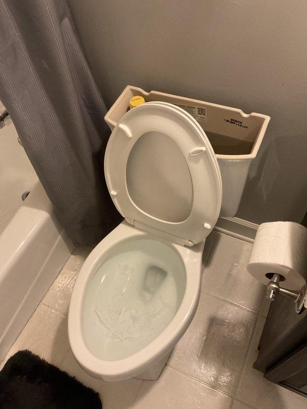 Responded to a main sewer line backup affecting two toilets and a bathtub, with sewage surfacing through the fixtures. Protected the work area with plastic sheeting, accessed the main line cleanout, and ran a drain machine with cable to clear the blockage and restore full flow. Flushed fixtures to confirm proper drainage, with water now draining freely and no further backup observed.