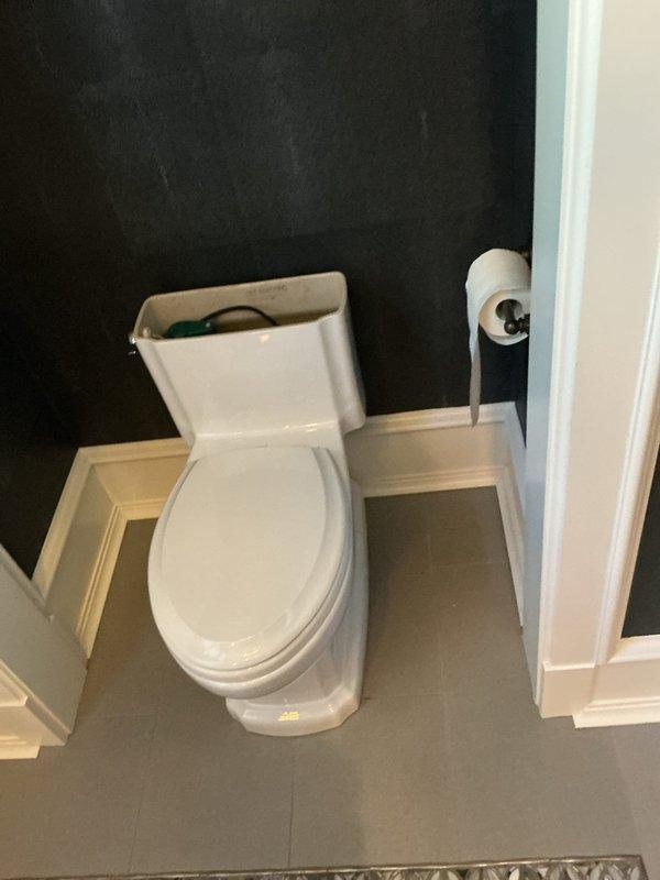 Inspected the toilet for a continuously running condition and removed the tank lid to access the internal fill and flush components. Evaluated the fill valve, flapper, and water level settings, then adjusted and serviced the components as needed to stop the constant refill. Reseated the tank lid, tested multiple flush cycles to verify proper shutoff, and confirmed the toilet operates correctly with no continuous running or leaks.