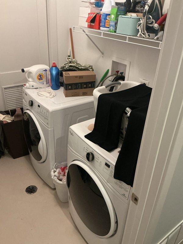 Performed an on-site estimate for installation of a utility sink in the laundry room, assessing the available wall space and nearby plumbing. Verified an existing floor drain and recessed supply box in the laundry area, and inspected the adjacent mechanical closet, noting accessible copper supply lines with isolation valves, an expansion tank, and PVC drain piping that can serve as tie-in points. No leaks, active corrosion, or damage were observed, and photos were documented for the quote.