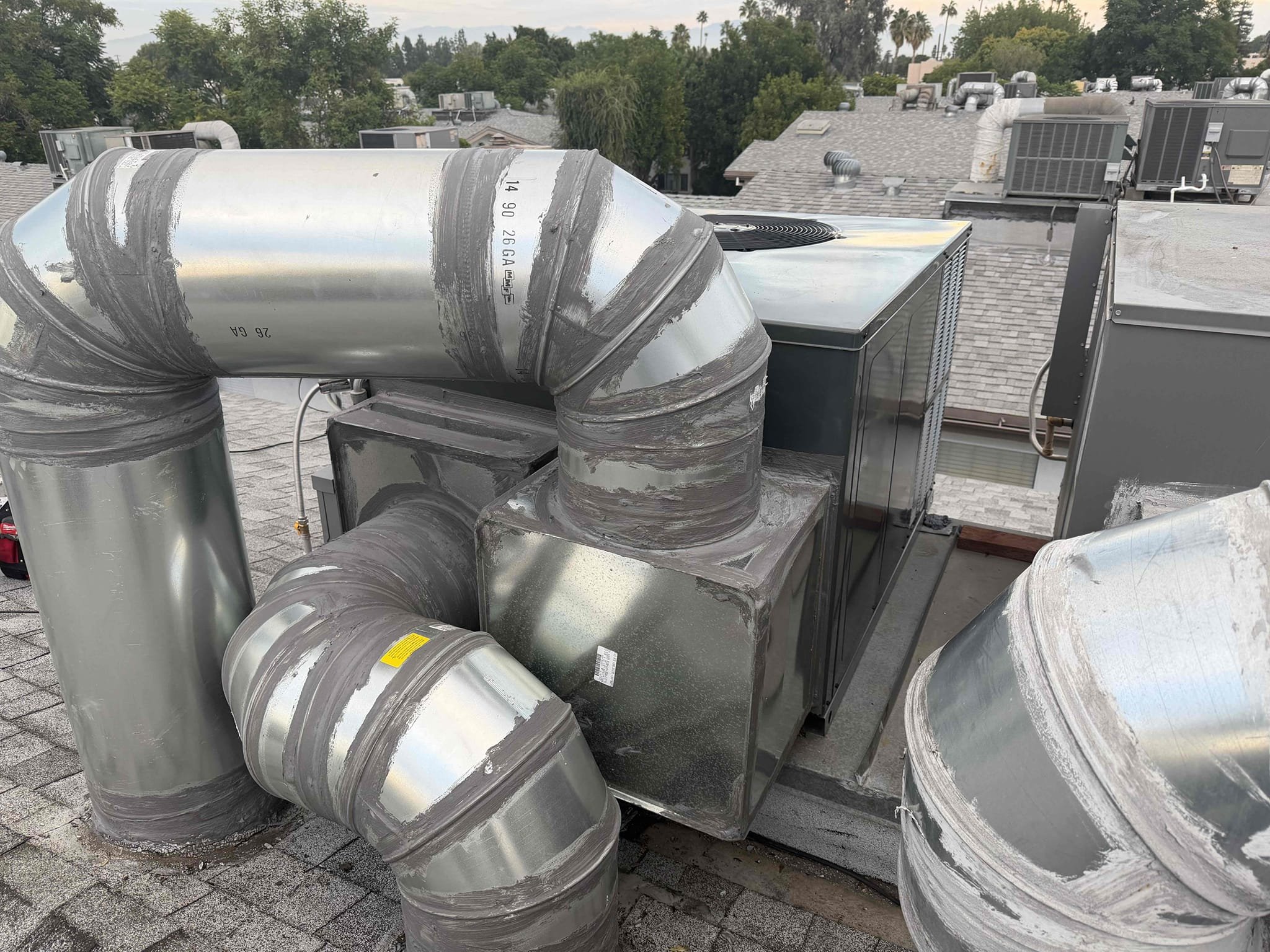 I am a skilled professional that works for a Affordable Heating and Air company. I recently completed a job for a customer who needed a new Goodman 13.4 SEER 2-ton package unit installed. The job included removing the existing unit, providing and installing a new disconnect box, electrical power whip, flex gas line, sediment trap, Glencote seal, reconnecting to and blowing out existing condensation lines, providing a crane to transport the package unit to the roof, and including permits and title 24 HERS testing. The payment method was 10% deposit or up to $1000/70% upon crew arrival with equipment/20% upon start-up of the unit. The Goodman warranties included a 1-year labor warranty, 10-year limited warranty on parts, 10-year limited warranty on the compressor, and 20-year limited warranty on the heat exchanger.