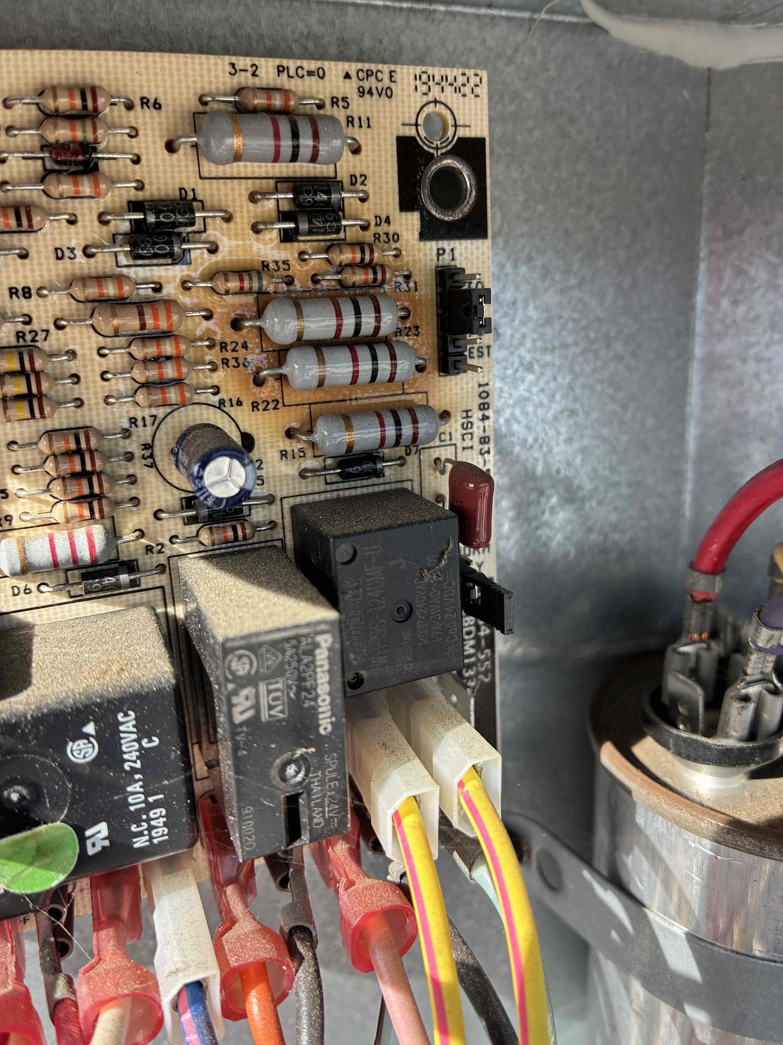 Upon arrival, I found the indoor fan was running, but the system wasn't heating or cooling. The outdoor unit's breaker was off, not tripped, so I reset it, restoring normal operation. I replaced the 20×20×1 air filter during the visit. Further inspection revealed a loud buzzing from the contactor, suggesting a weak coil. The defrost control board showed visible overheating and burn marks, indicating electrical stress. The system is currently operational, but the weakened contactor and overheated defrost board could cause future issues. I recommend replacing both the contactor and the defrost control board.