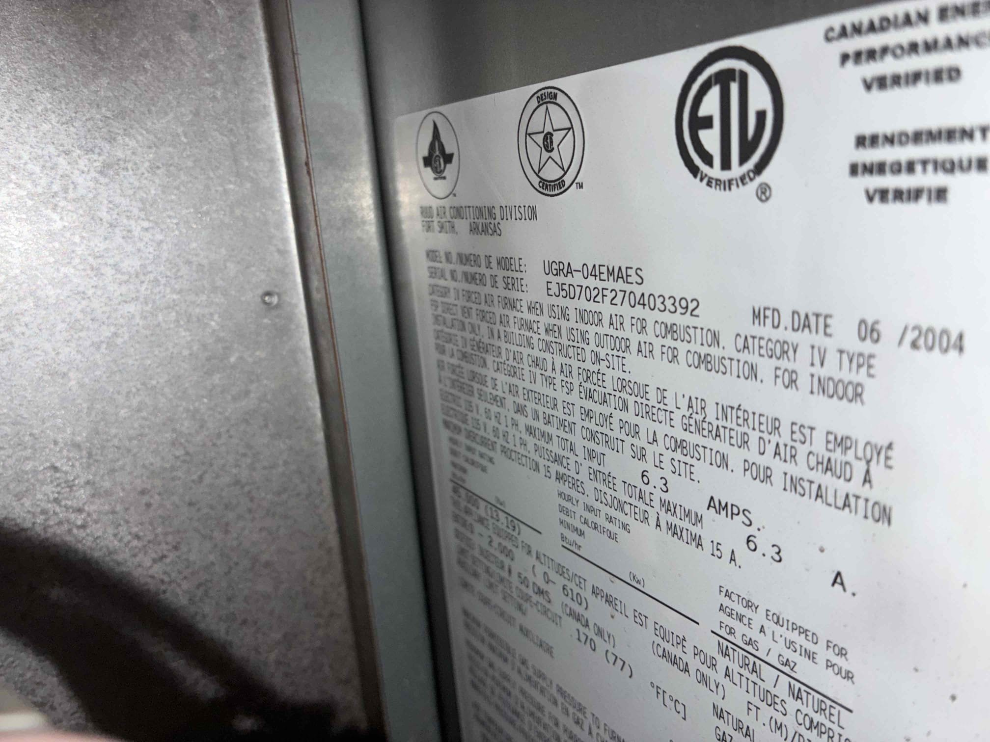 Upon inspection of the 2004 Rheem Furnace, I found the blower wheel heavily soiled, the blower motor leaking oil, and the capacitor weak. These issues cause inconsistent airflow and difficulty maintaining the set temperature. I recommended cleaning the blower wheel, replacing the blower motor and capacitor, and upgrading the thermostat for better control. Despite the furnace's age, repairs can improve performance, though replacement may be necessary in the future.