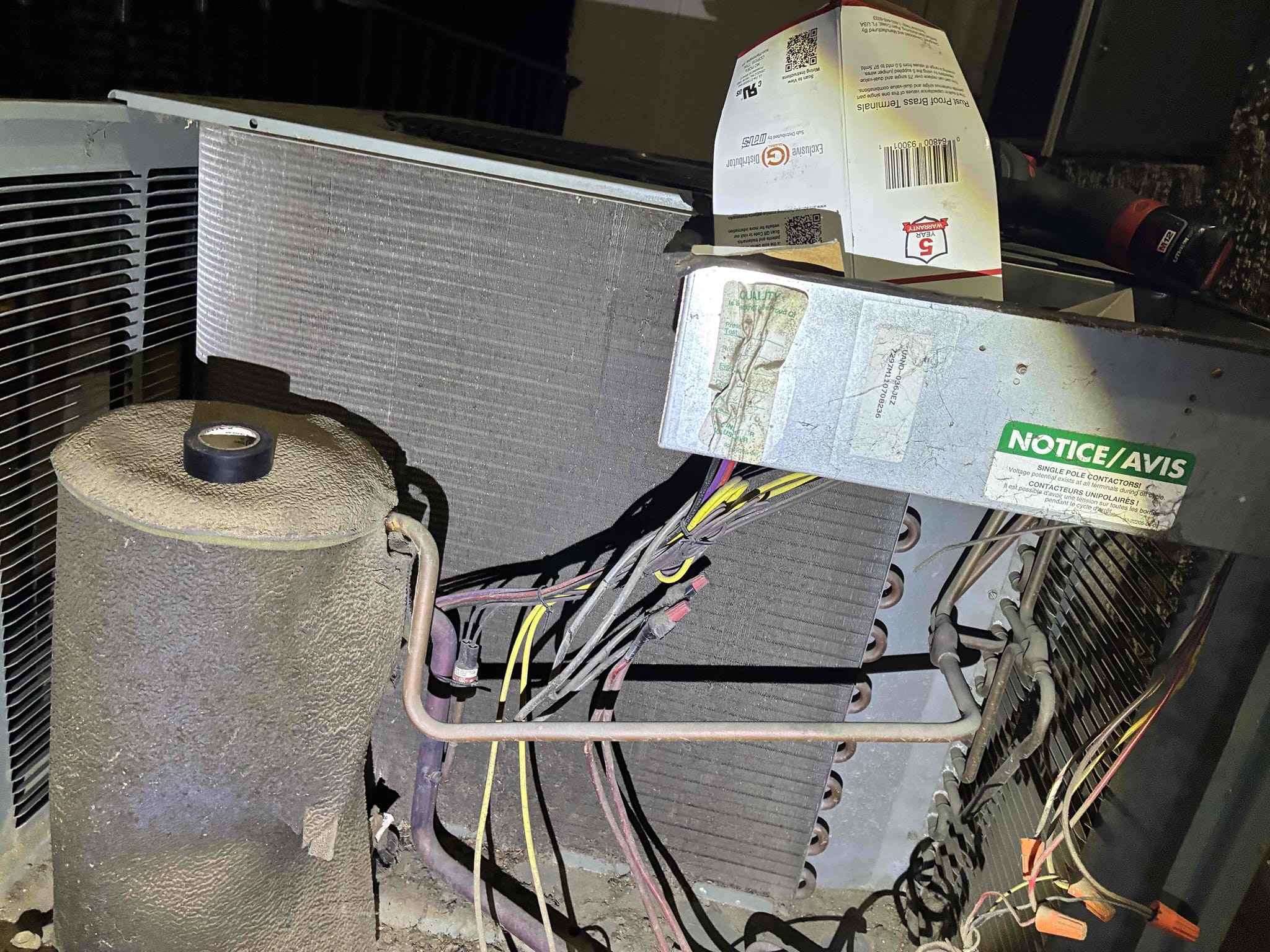 I diagnosed a 2007 Rheem condenser where the indoor blower motor worked, but the outdoor fan and compressor didn't start. Testing the 50/10 MFD capacitor showed it had failed completely. After installing a new test capacitor, the system started cooling normally. I also found a blocked drain pan outlet and a dusty blower wheel. Recommendations include replacing the capacitor, monitoring the compressor, cleaning the drain line, and cleaning the blower wheel and coils.
