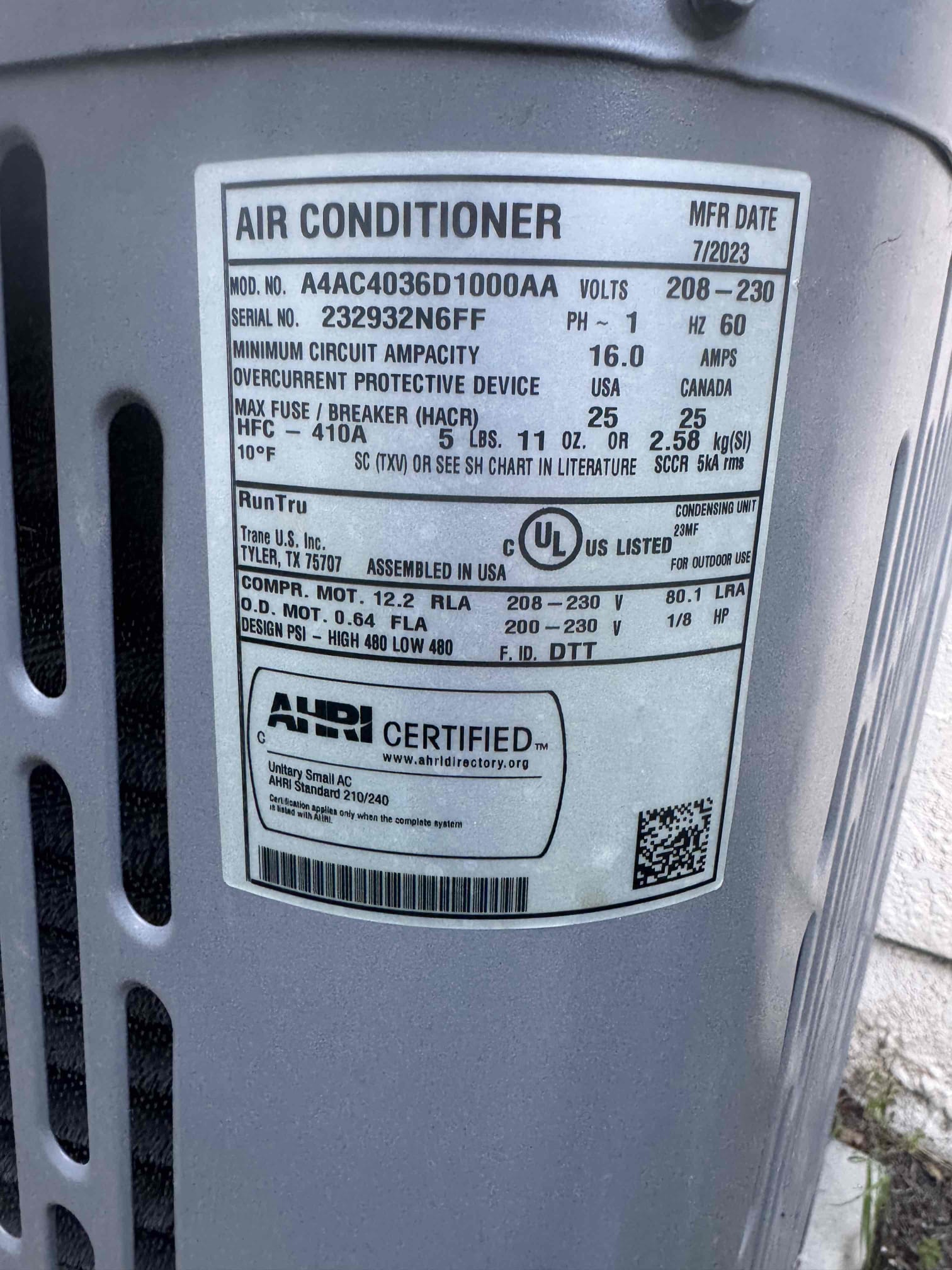 Upon arrival, the system was not cooling. The outdoor condenser dual run capacitor had failed and was visibly swollen, preventing proper operation. The defective capacitor was replaced with a manufacturer-specified 45/5 MFD unit. Post-installation, the system operated normally, with the outdoor fan motor and compressor starting correctly. The return air filter was heavily loaded, restricting airflow, and should be replaced. The system is now cooling effectively.