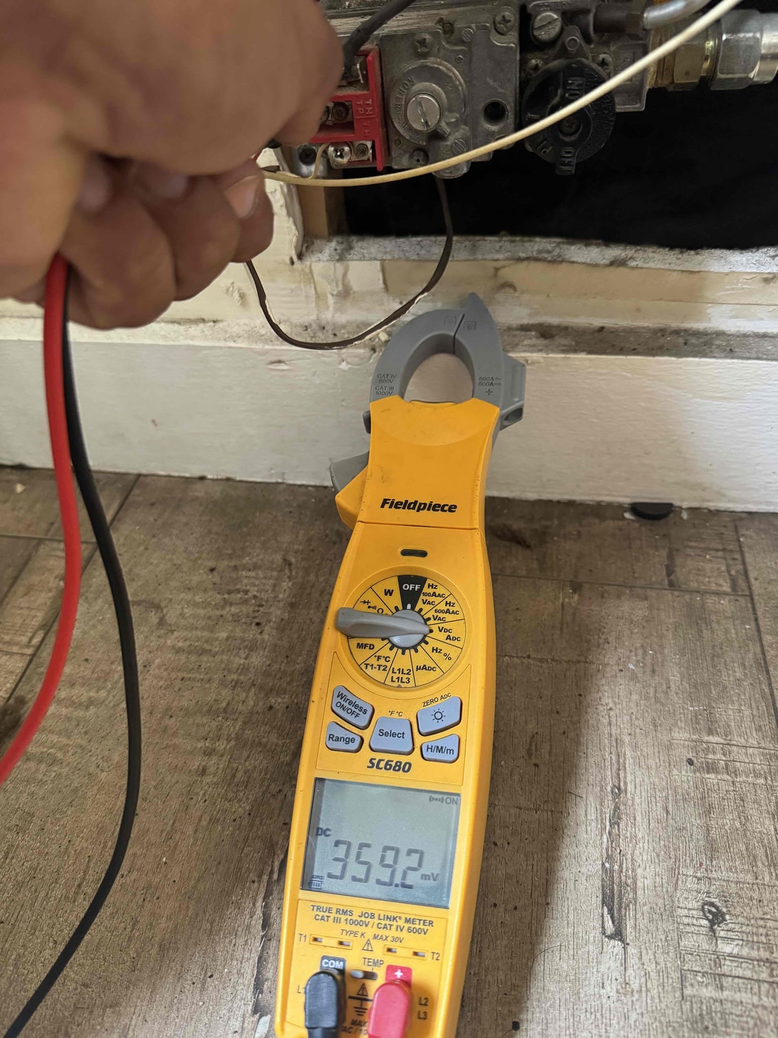 We completed a repair on an existing Williams wall furnace, replacing the thermopile assembly and heat-only thermostat. The original thermopile was producing low millivolt output, which prevented reliable operation during a normal call for heat. The thermostat also failed during a call for heat. After installing the new thermopile and thermostat, we cycled the furnace through multiple heating operations to ensure proper performance. The pilot flame remains stable, the main burners ignite correctly, and the furnace responds accurately to thermostat demand. The system is now operating as designed and providing heat throughout the residence. Due to the age of the furnace, we cannot guarantee the condition or remaining service life of other original components. However, the unit was found to be operating normally at the time of departure. We advised the tenant to maintain a functioning combination smoke and carbon monoxide detector within the residence for safety when operating gas-fired h