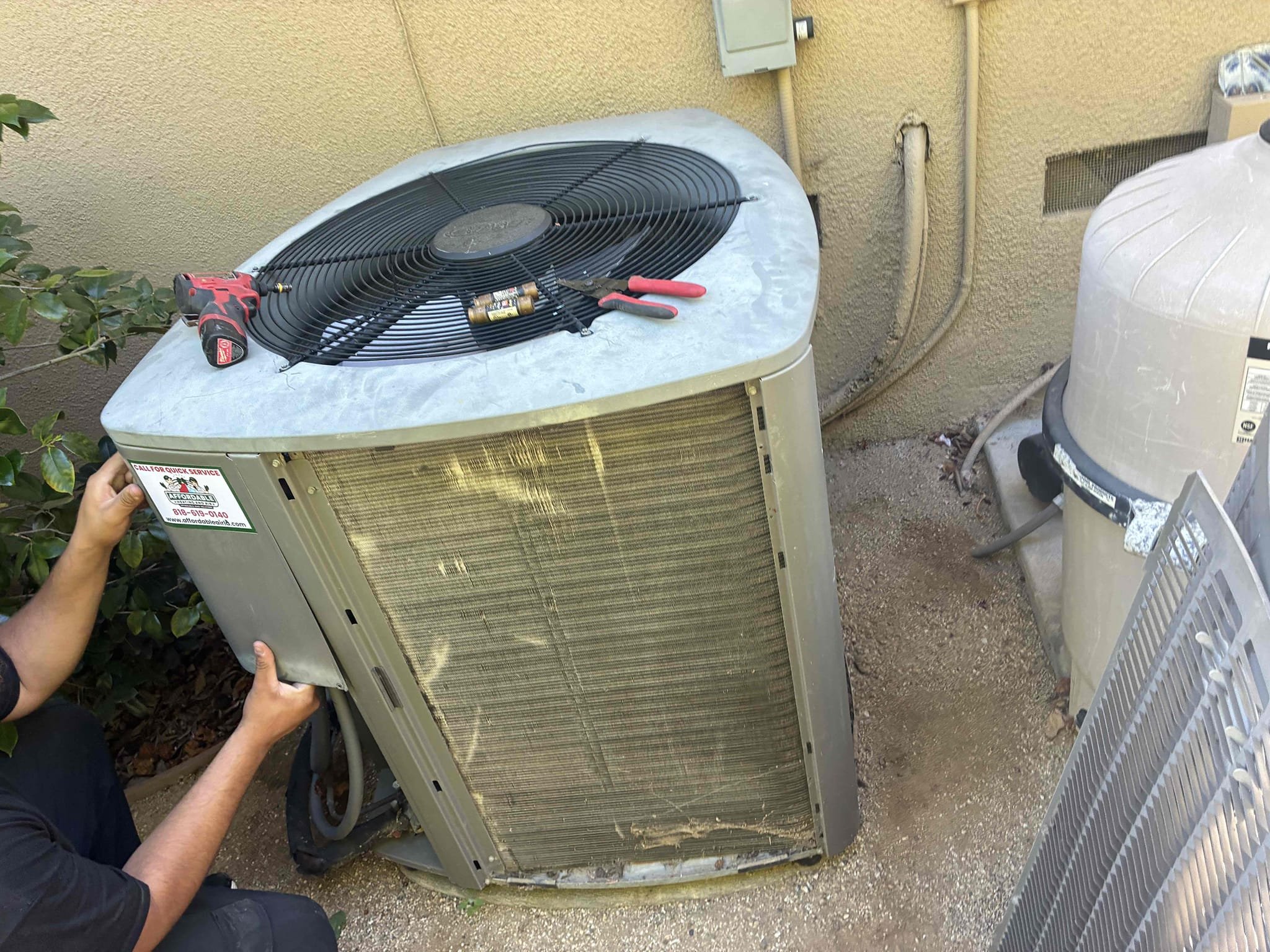 I conducted a thorough maintenance and safety inspection on the 2012 Lennox air conditioning system. The air filter, recently replaced in March, was found to be in excellent condition. The blower wheel was cleaned to ensure optimal airflow. The condensate drain line was inspected and confirmed to be clear and draining properly. Refrigerant pressures were checked and met manufacturer specifications. All electrical components were inspected, with recently replaced parts operating correctly. The outdoor condenser was functioning properly and cooling as designed. The only issue was dirt buildup on the condenser coils, which I addressed by performing a cleaning to enhance system efficiency and performance. The system is now operating correctly and cooling the home effectively.