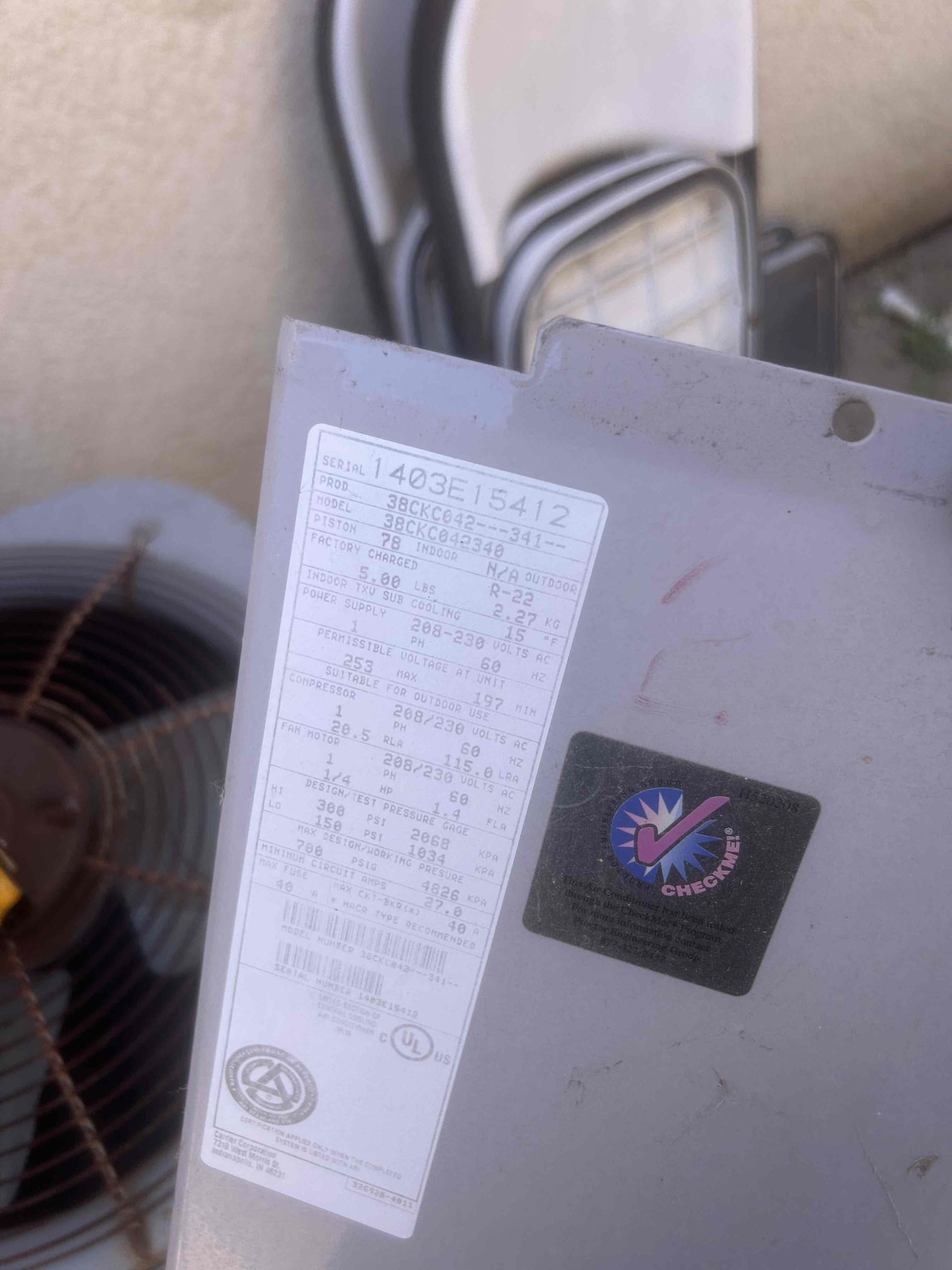Upon arrival, I assessed an AC system that was not functioning. The equipment, an older R-22 model, was found to be non-operational. The compressor was burnt out, and the harness was melted. Additionally, the system had a tripped breaker, a faulty capacitor, and was heavily soiled. To ensure proper operation, the compressor needed replacement. I also discovered that the condenser fan motor was rusted out. Given the age and condition of the equipment, I strongly recommend replacing the entire system.