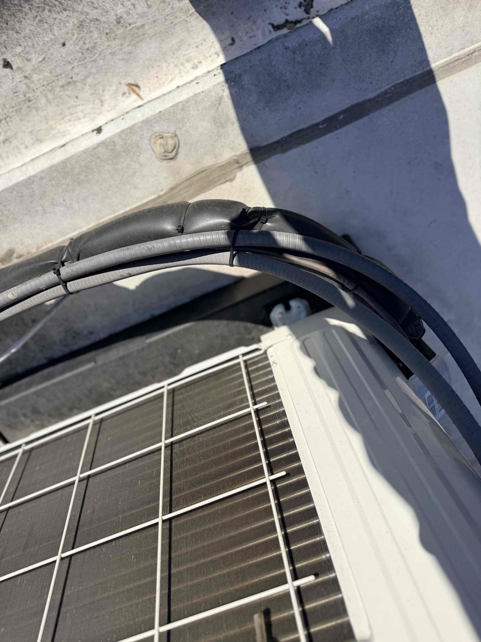I conducted a comprehensive inspection of the system. The air handler's blower motor and evaporator were found to be exceptionally clean. The control board displayed no burn marks and was in excellent condition. The line set around the air handler was intact with no visible cracks. After one minute of operation, the temperature difference was measured at 15 degrees, indicating optimal performance. The condenser unit's control board, coil, and blower motor were all in good shape. However, the disconnect box lacked a surge protector, which is advisable for protection. Additionally, the line set insulation was beginning to crack and will require replacement. Apart from these issues, the system is functioning properly. I conducted a comprehensive inspection of the system. The air handler's blower motor and evaporator were found to be exceptionally clean. The control board displayed no burn marks and was in excellent condition. The line set around the air handler was intact with no visible cracks. After one minute of operation, the temperature difference was measured at 15 degrees, indicating optimal performance. The condenser unit's control board, coil, and blower motor were all in good shape. However, the disconnect box lacked a surge protector, which is advisable for protection. Additionally, the line set insulation was beginning to crack and will require replacement. Apart from these issues, the system is functioning properly.