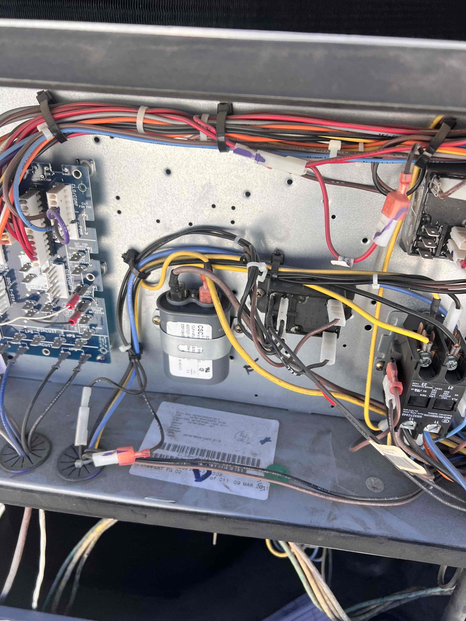 Upon arrival, the customer reported a lack of cooling. I verified the thermostat readings, which were accurate. To rule out a thermostat issue, I swapped it with another unit, but the system still did not operate. I checked the circuit board and safety board, finding no issues. I then inspected the disconnect, high and low pressure switches, and reset the disconnect. Upon discovering no power on the low pressure switch, I traced the issue to a loose connection, which I promptly fixed. The system started immediately, and I recommended a couple of minor repairs to maintain system health and prevent future issues.