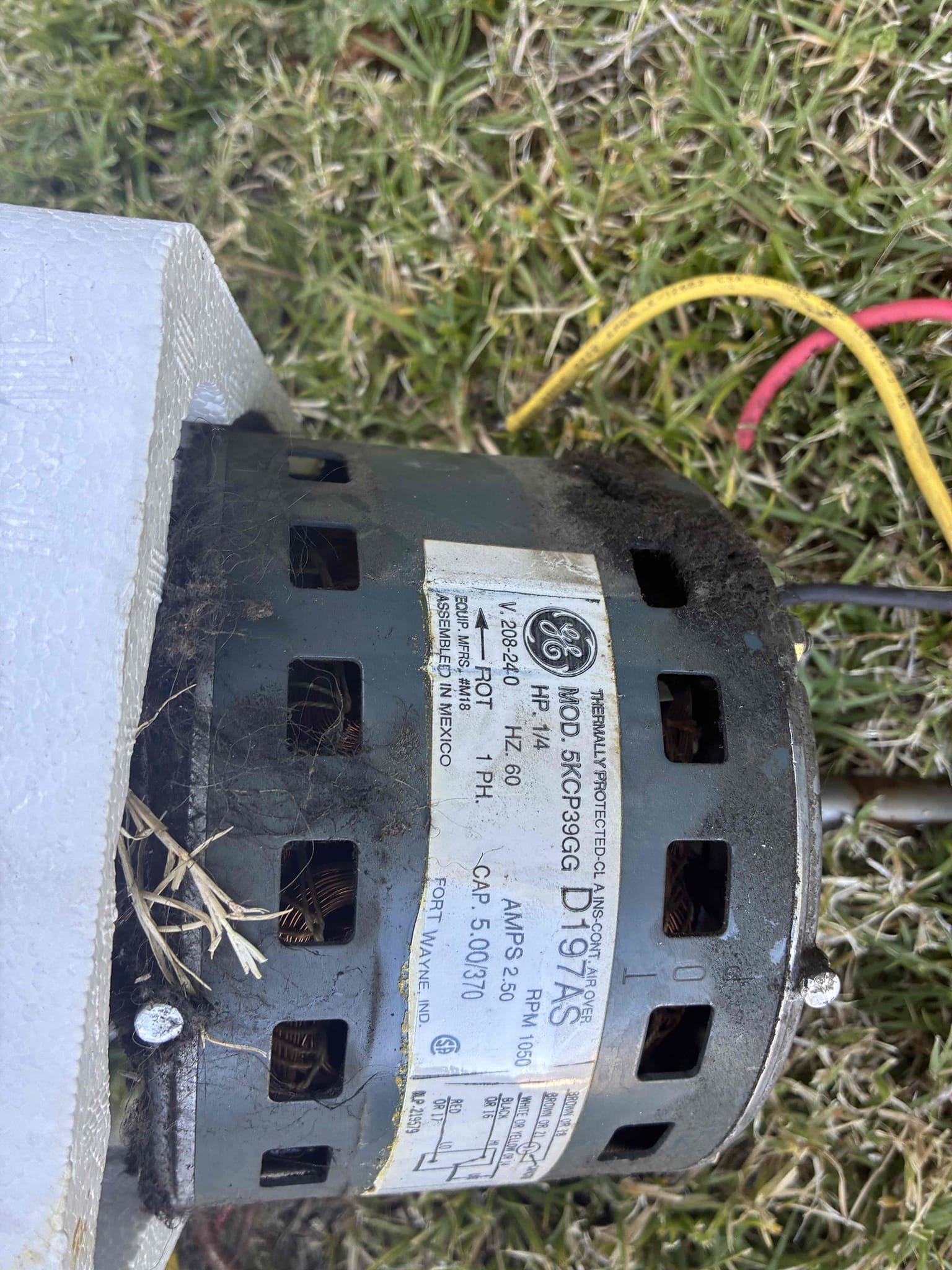 Upon inspection, the downstairs air handler exhibited a loud thumping noise. The blower motor was leaking oil and heavily clogged with dust. Given the system's age, replacing the blower motor and cleaning the assembly is a temporary fix. For the upstairs system, low refrigerant readings indicate an active leak. Adding refrigerant and sealant is a temporary solution, but replacement is recommended due to the system's age and refrigerant type. Upon inspection, the downstairs air handler exhibited a loud thumping noise. The blower motor was leaking oil and heavily clogged with dust. Given the system's age, replacing the blower motor and cleaning the assembly is a temporary fix. For the upstairs system, low refrigerant readings indicate an active leak. Adding refrigerant and sealant is a temporary solution, but replacement is recommended due to the system's age and refrigerant type.