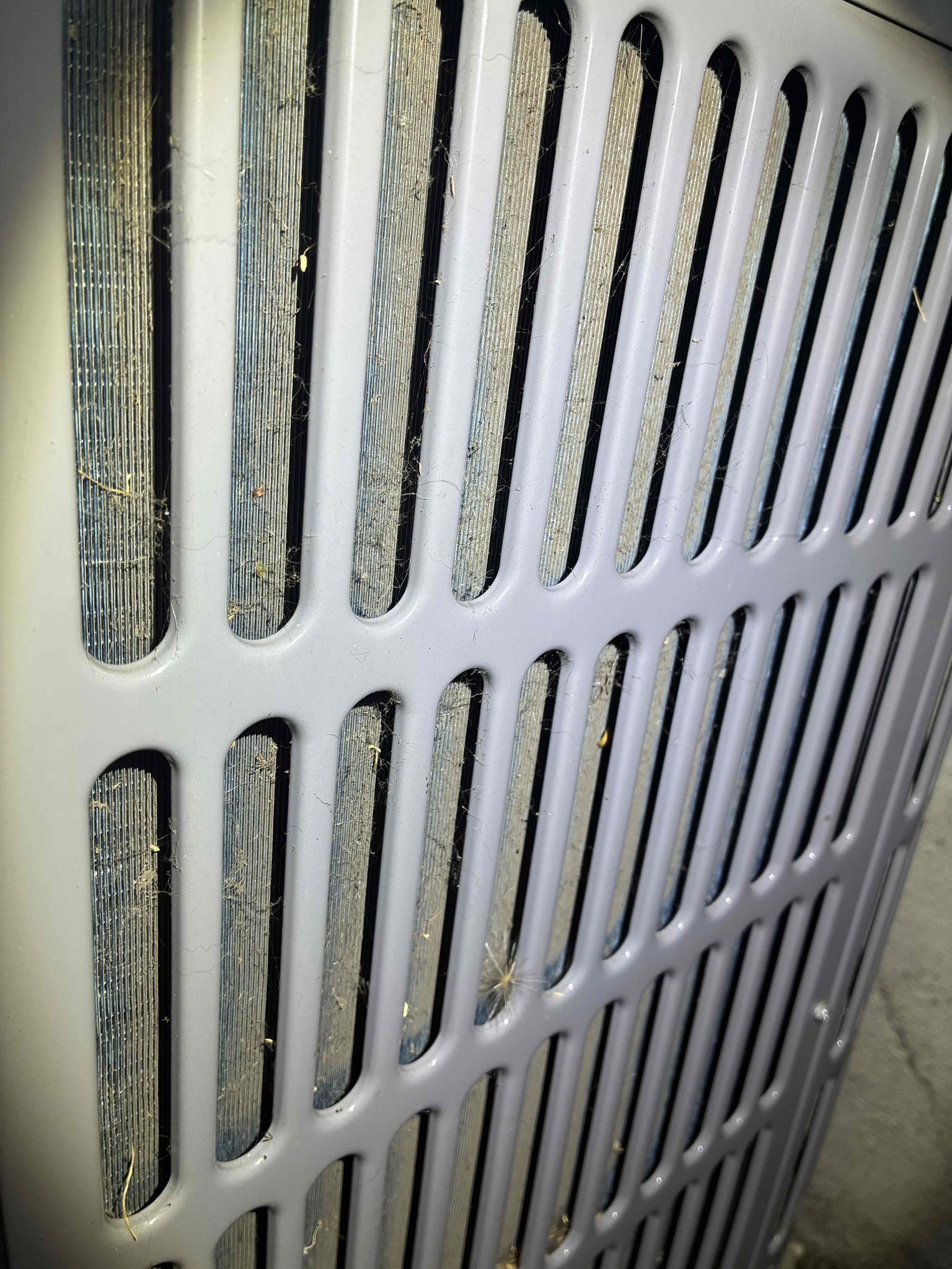 Upon arrival, I conducted a thorough diagnostic assessment of the 2014 Goodman Furnace paired with a 2024 Coil & Condenser. The client reported issues with the system not cooling adequately. After walking through the property with the client, I confirmed that the system was actively cooling, and temperature probes were installed to verify performance. Refrigerant pressures and operating conditions were within manufacturer specifications, and the system was producing an acceptable 20°F temperature split across the evaporator coil.
Further inspection revealed that the evaporator coil was clean, the drain pan was dry, and the SS2 safety switch was operating properly. The blower motor, recently replaced, was overheating due to a weak capacitor. Electrical testing confirmed the capacitor was significantly below the acceptable range (16.8 MFD vs. 19-21 MFD). Additionally, the outdoor condenser coils were dirty, which I cleaned to improve efficiency. I recommended replacing the capacitor and 