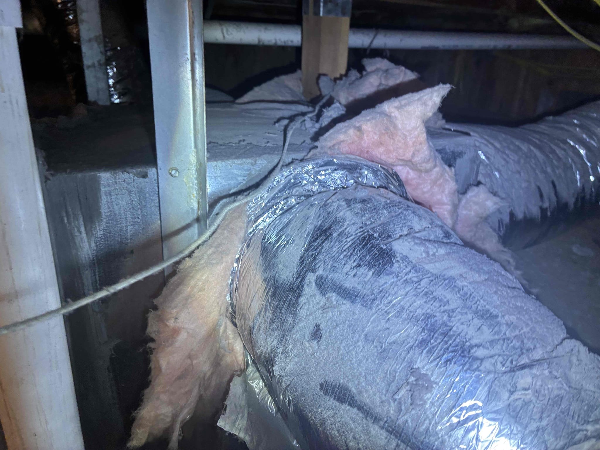 Los Angeles, CA - Upon arrival, I assessed the system and found it was operational. The customer highlighted that the airflow in the master bedroom was significantly weaker compared to other areas. I inspected the vent and discovered the damper was closed, which I promptly opened, resulting in improved airflow but still lower than desired. Further investigation revealed no collapsed ducts but noted the absence of balancing dampers, which are essential for proper airflow distribution. Additionally, I identified an improperly installed dryer vent, which was discharging lint and debris under the home, posing potential safety and airflow issues. I recommended replacing and properly sizing the ductwork to enhance airflow balance and correcting the dryer vent termination to prevent contamination and ensure safety.
