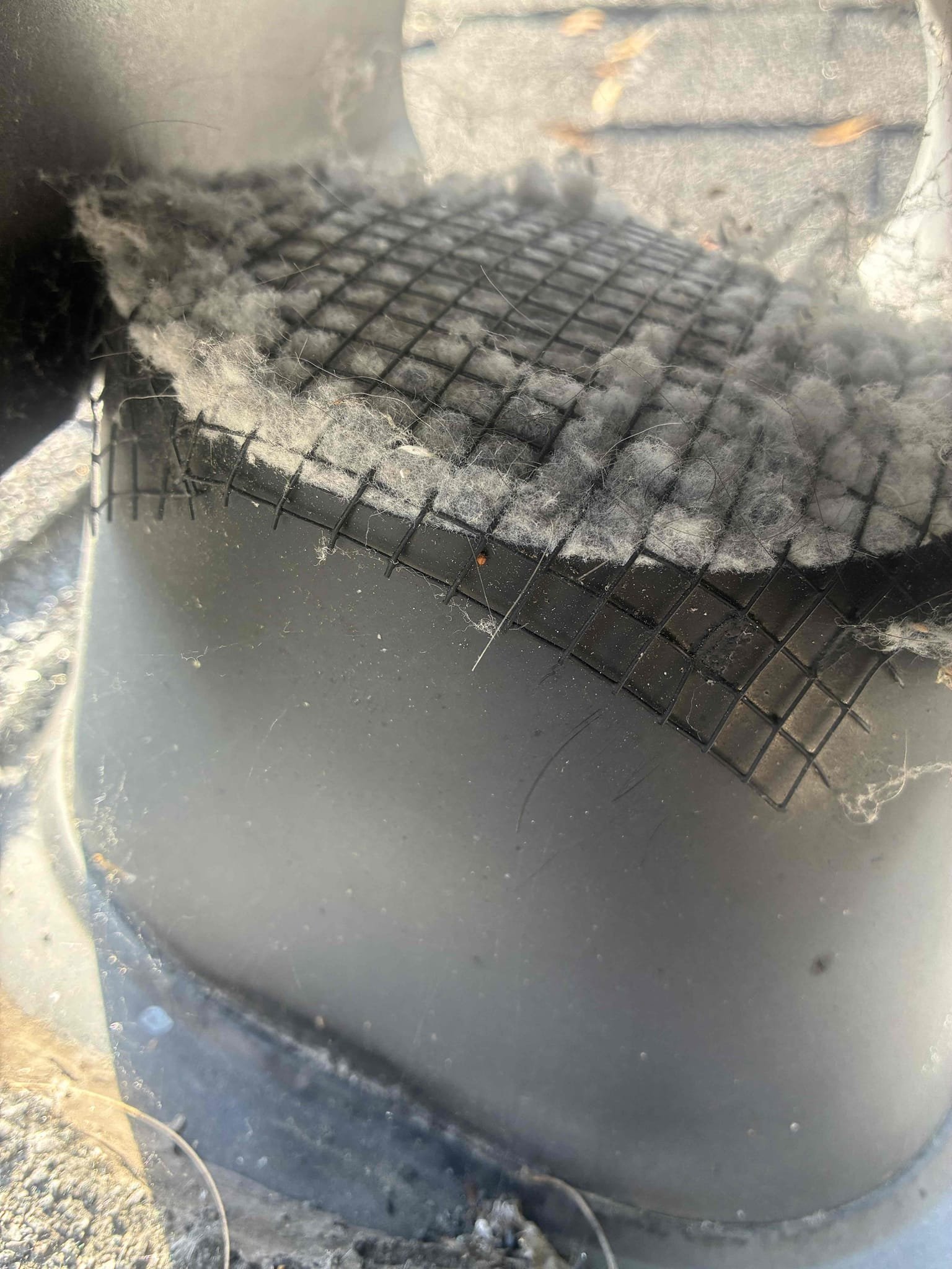 Upon inspection, the current dryer vent roof cap was found unsuitable for proper dryer exhaust termination, leading to lint buildup at the rodent-proof cage. This buildup restricts airflow, increasing drying times and straining the dryer. I replaced the existing roof cap with an approved model, ensuring efficient venting. This correction prevents potential hazards and restores optimal dryer performance.